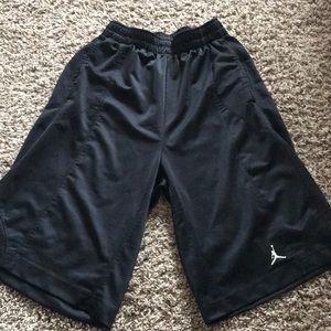 Black long basketball shorts